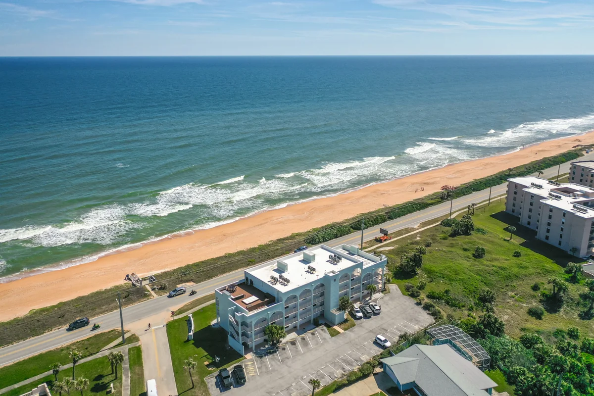 Aerial view of the car-free no-drive beach and Atlantic coastline at Ormond-by-the-Sea, Florida, with no vehicles on the sand